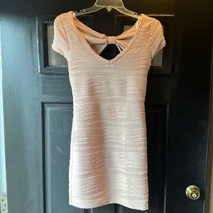 Dress with open back and bow